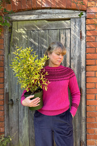 Classic Nordic fairisle jumper given a contemporary twist in bright magenta and rich plum patterning. Soft and washed. 100% Wool Made in Scotland, Justine Tabak 