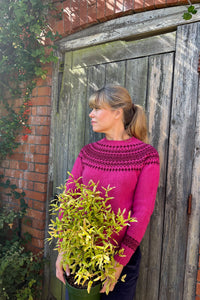 Classic Nordic fairisle jumper given a contemporary twist in bright magenta and rich plum patterning. Soft and washed. 100% Wool Made in Scotland, Justine Tabak 